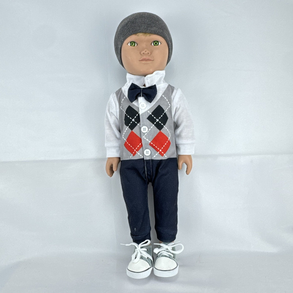 Cititoy 18-inch boy doll with green eyes wearing a knit beanie and argyle vest outfit