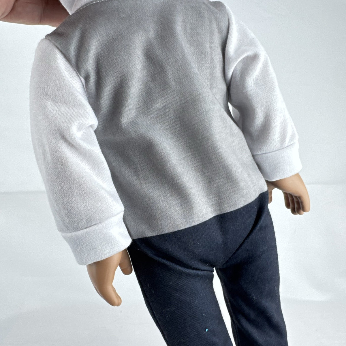 Cititoy 18-inch boy doll with green eyes wearing a knit beanie and argyle vest outfit