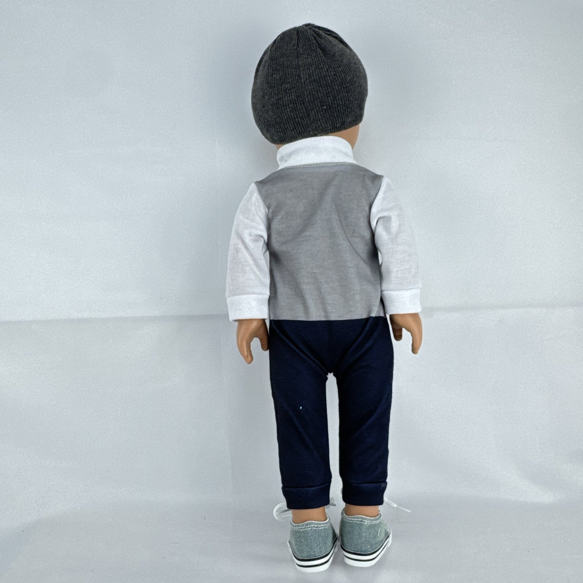 Cititoy 18-inch boy doll with green eyes wearing a knit beanie and argyle vest outfit