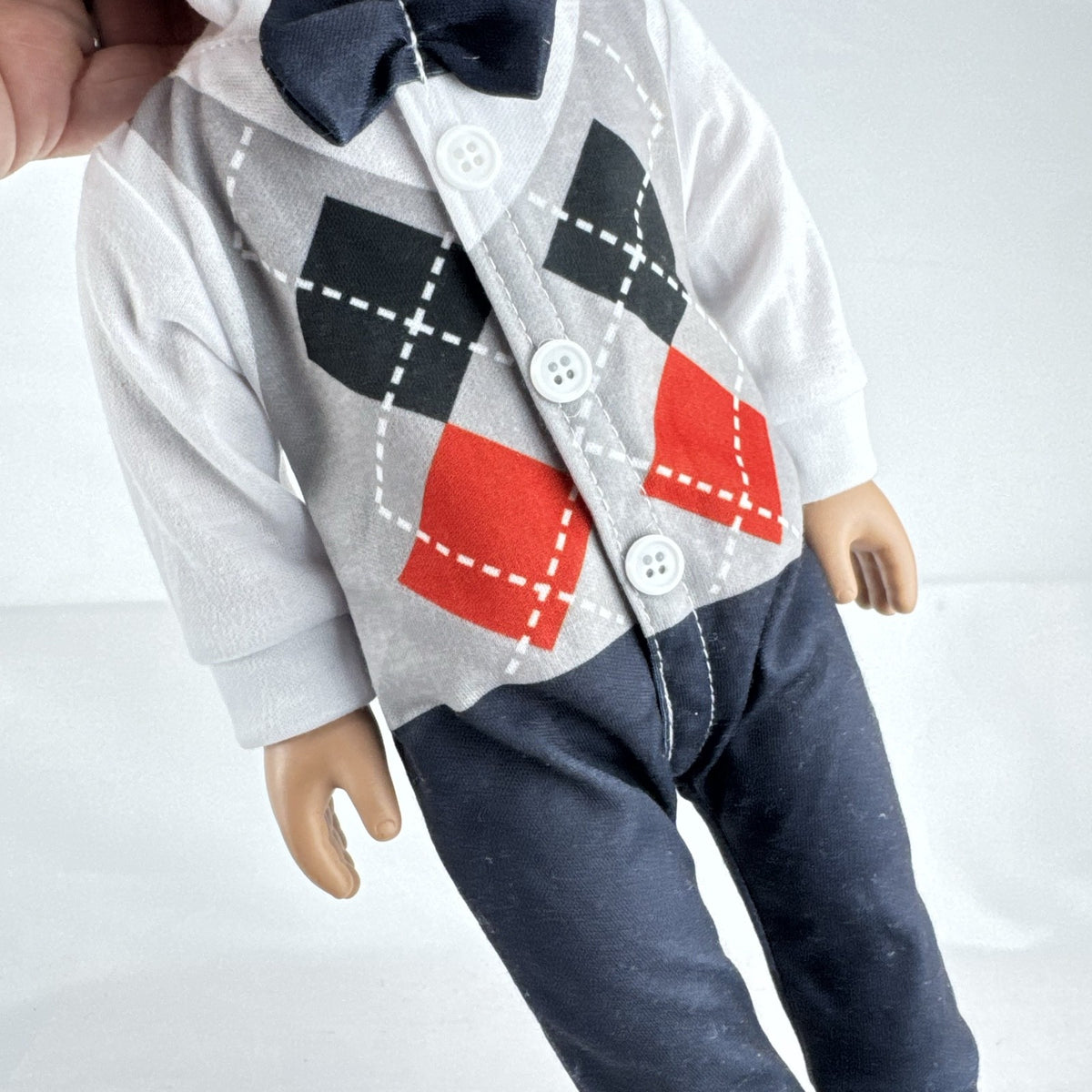 Cititoy 18-inch boy doll with green eyes wearing a knit beanie and argyle vest outfit