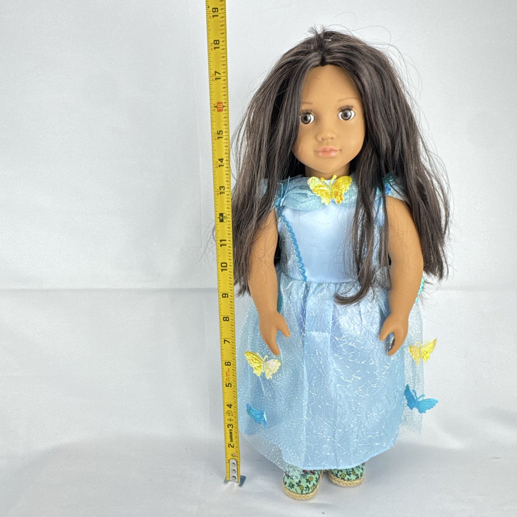 Our Generation 18-inch doll by Battat wearing a light blue butterfly princess dress and patterned shoes