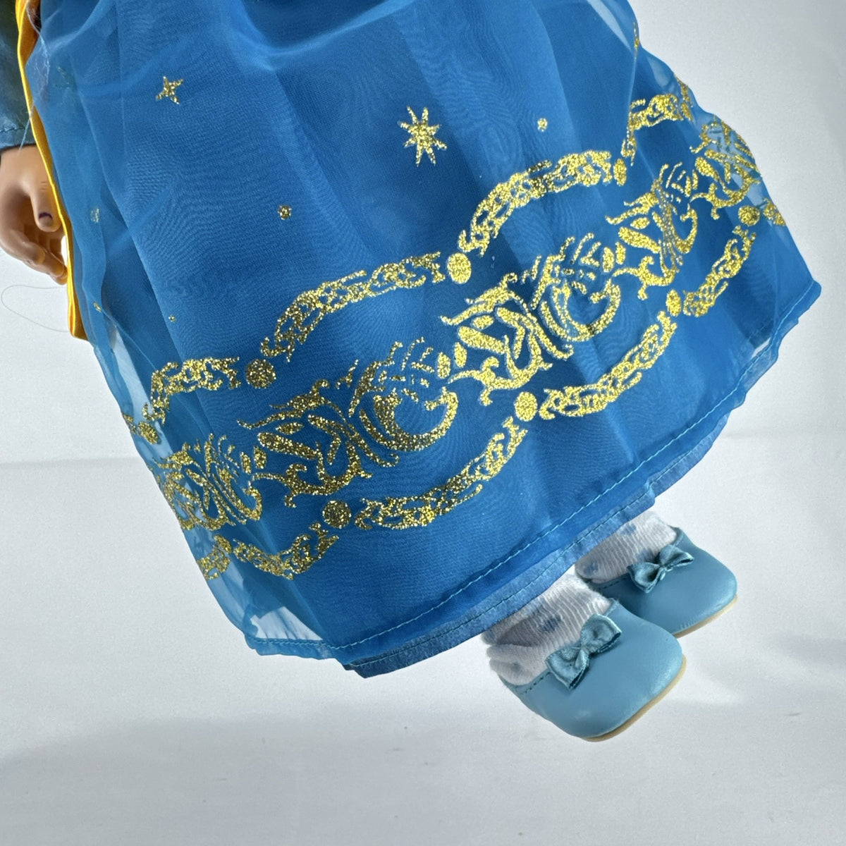 Cititoy 18-inch girl doll with wavy brown hair, blue highlight streak, and royal blue princess gown.