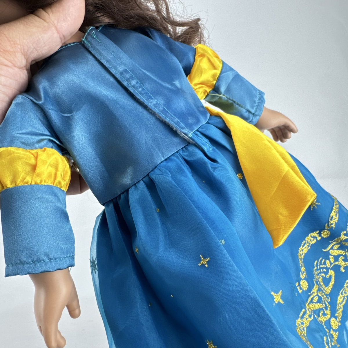 Cititoy 18-inch girl doll with wavy brown hair, blue highlight streak, and royal blue princess gown.