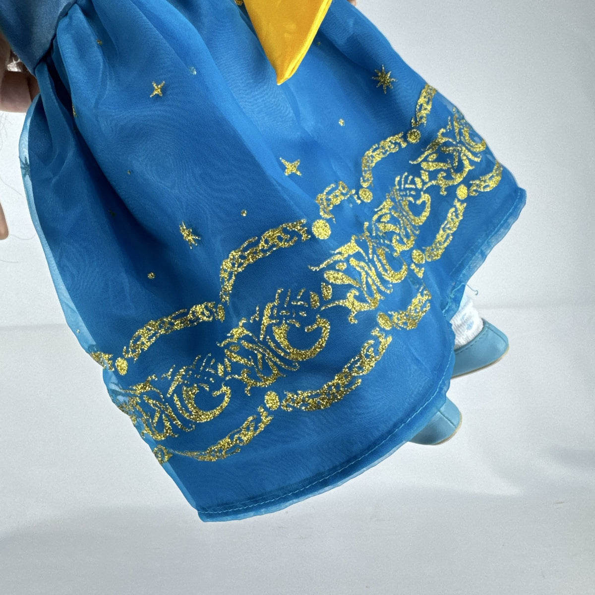 Cititoy 18-inch girl doll with wavy brown hair, blue highlight streak, and royal blue princess gown.