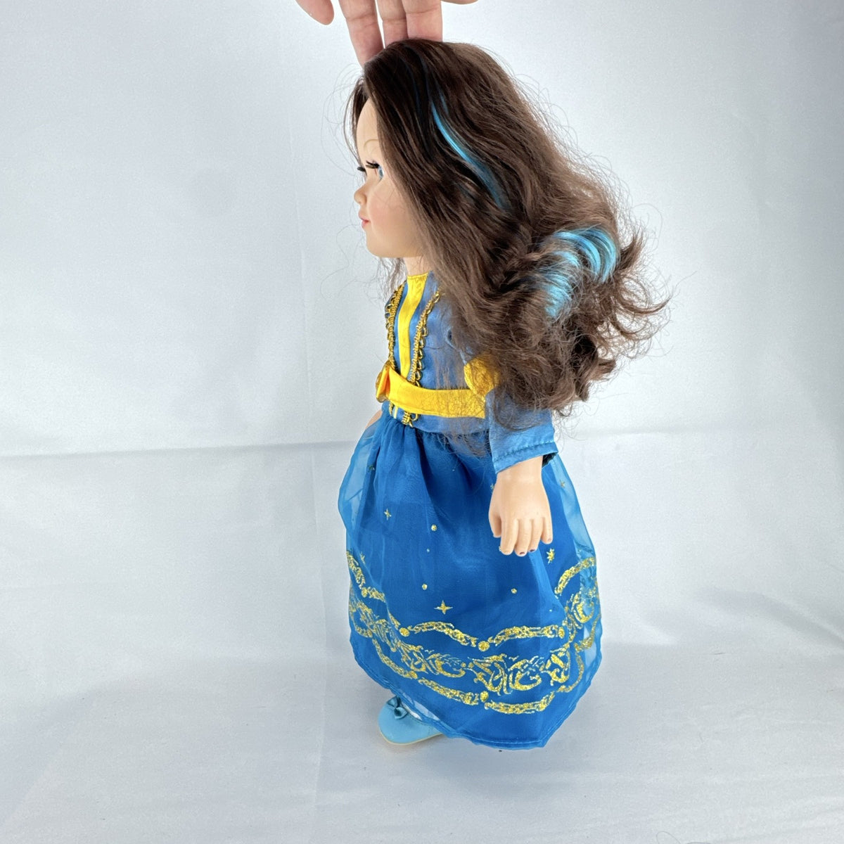 Cititoy 18-inch girl doll with wavy brown hair, blue highlight streak, and royal blue princess gown.