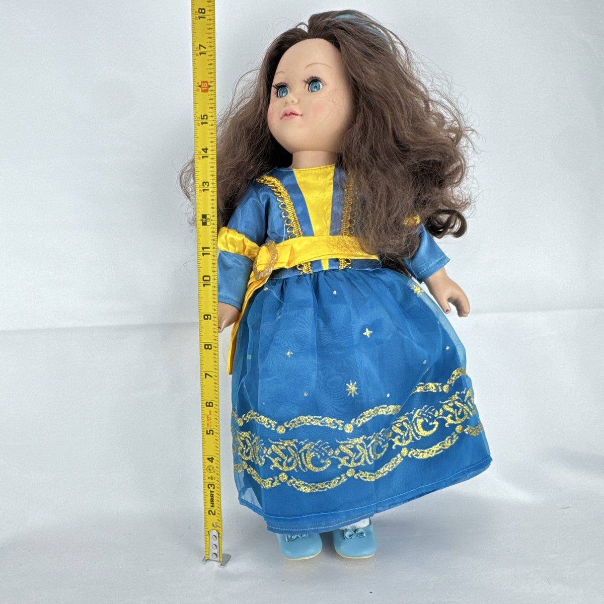 Cititoy 18-inch girl doll with wavy brown hair, blue highlight streak, and royal blue princess gown.