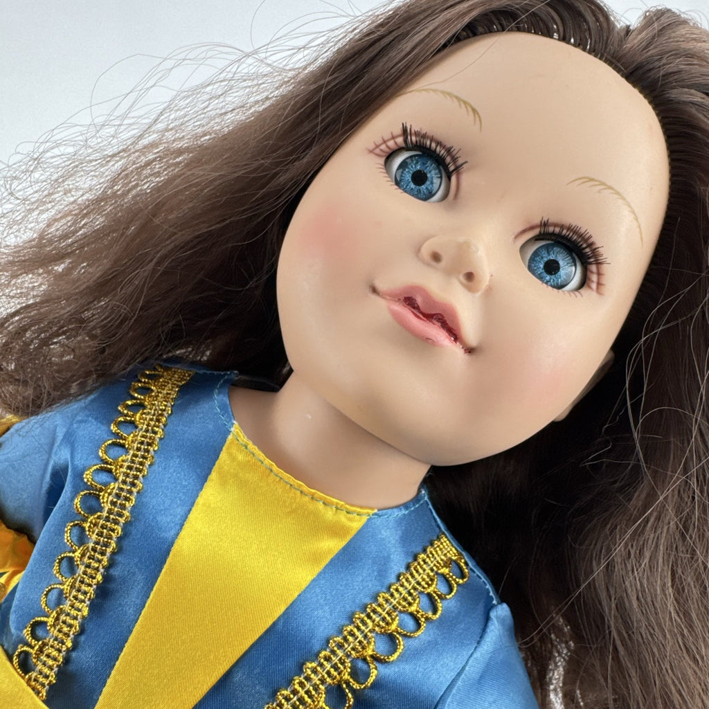 Cititoy 18-inch girl doll with wavy brown hair, blue highlight streak, and royal blue princess gown.