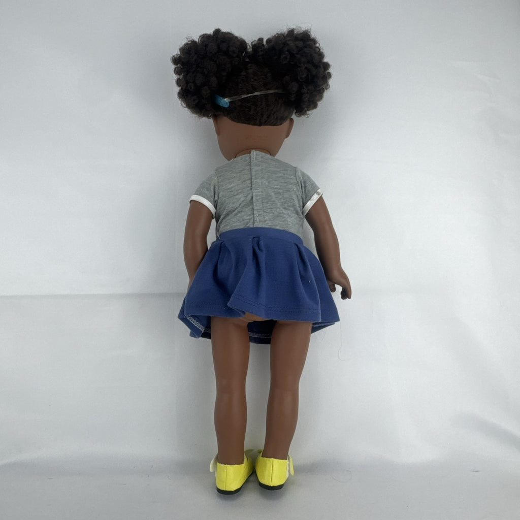 Cititoy 18-inch vinyl African American girl doll wearing grey shirt, blue skirt, and yellow shoes