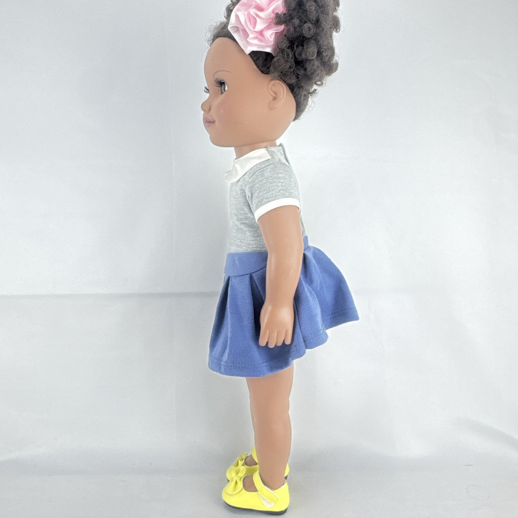 Cititoy 18-inch vinyl African American girl doll wearing grey shirt, blue skirt, and yellow shoes