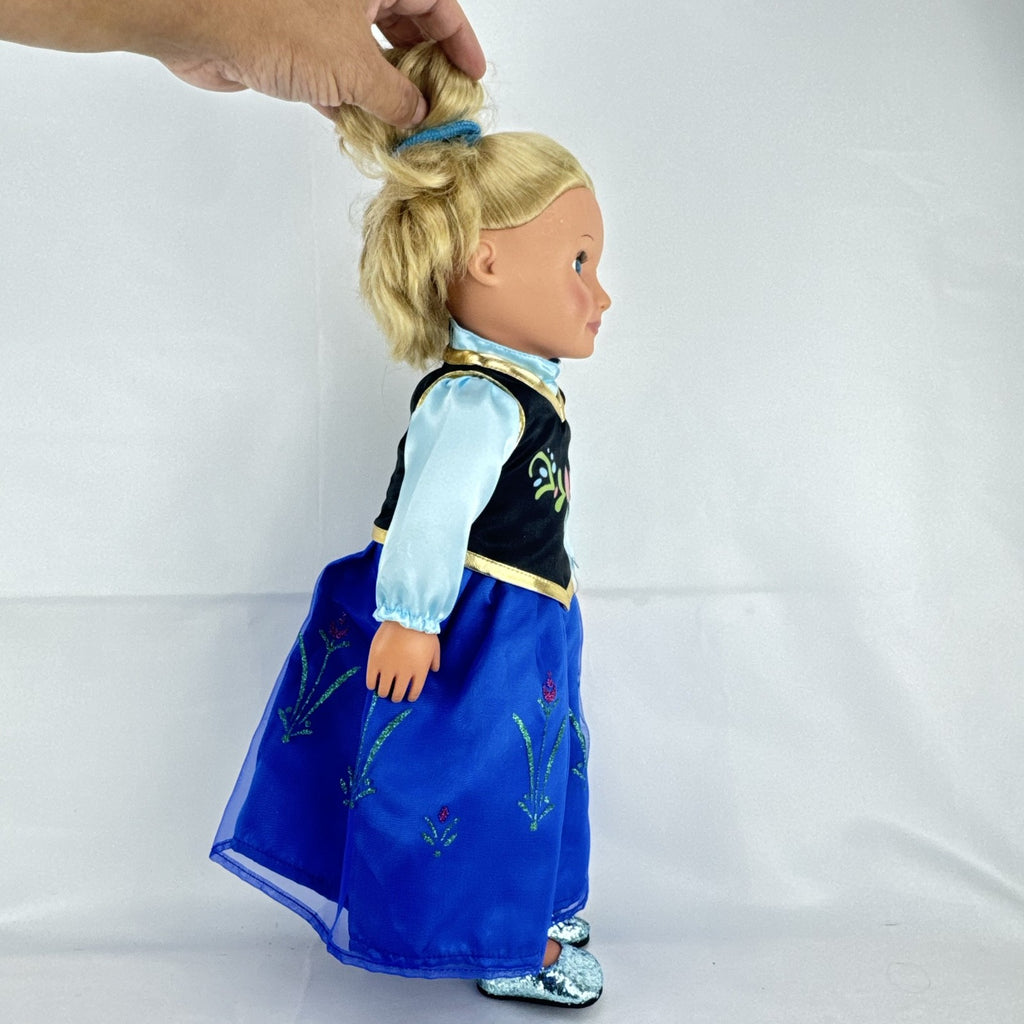 Battat Our Generation 18-inch blonde doll wearing a Disney Frozen Anna dress and blue glitter shoes