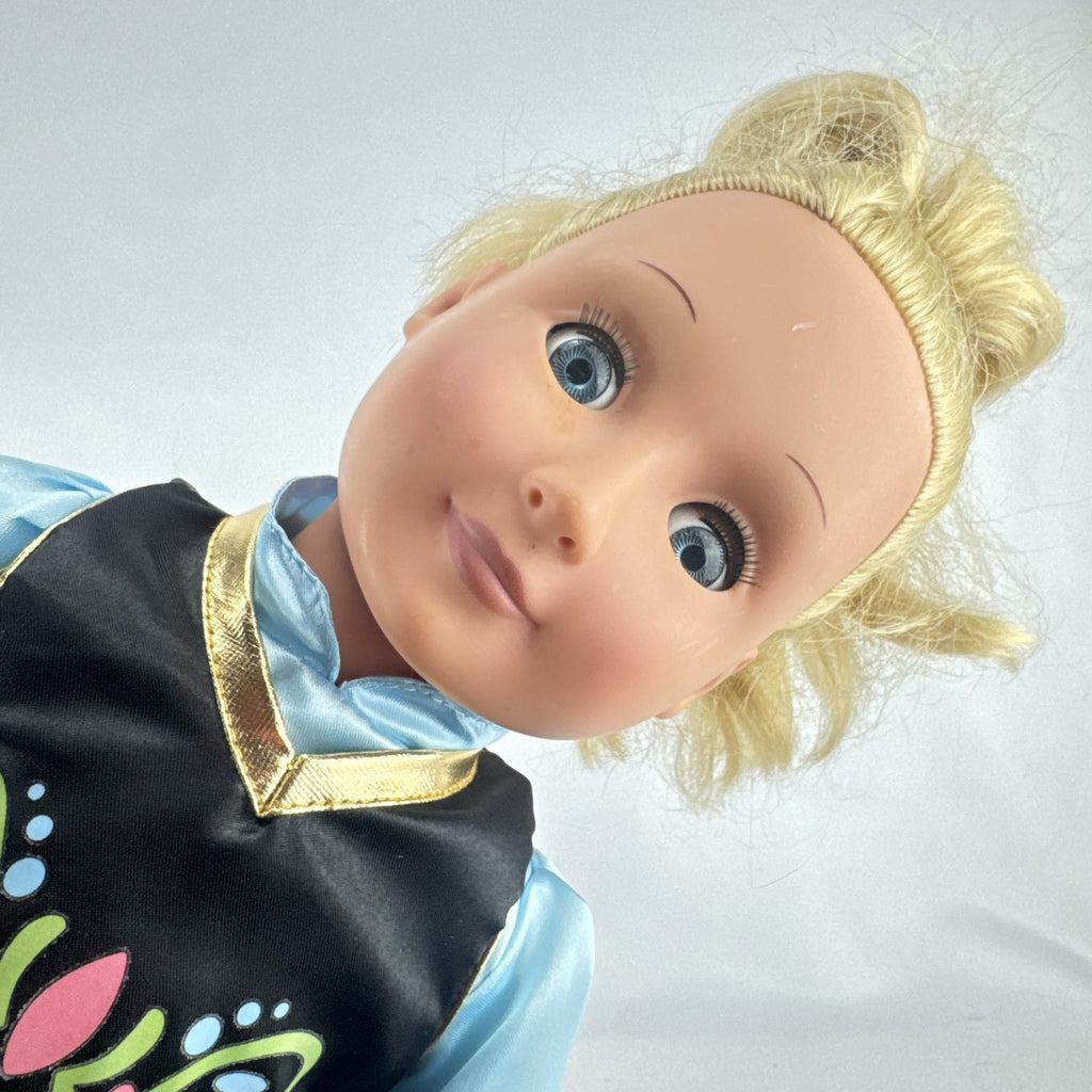 Battat Our Generation 18-inch blonde doll wearing a Disney Frozen Anna dress and blue glitter shoes