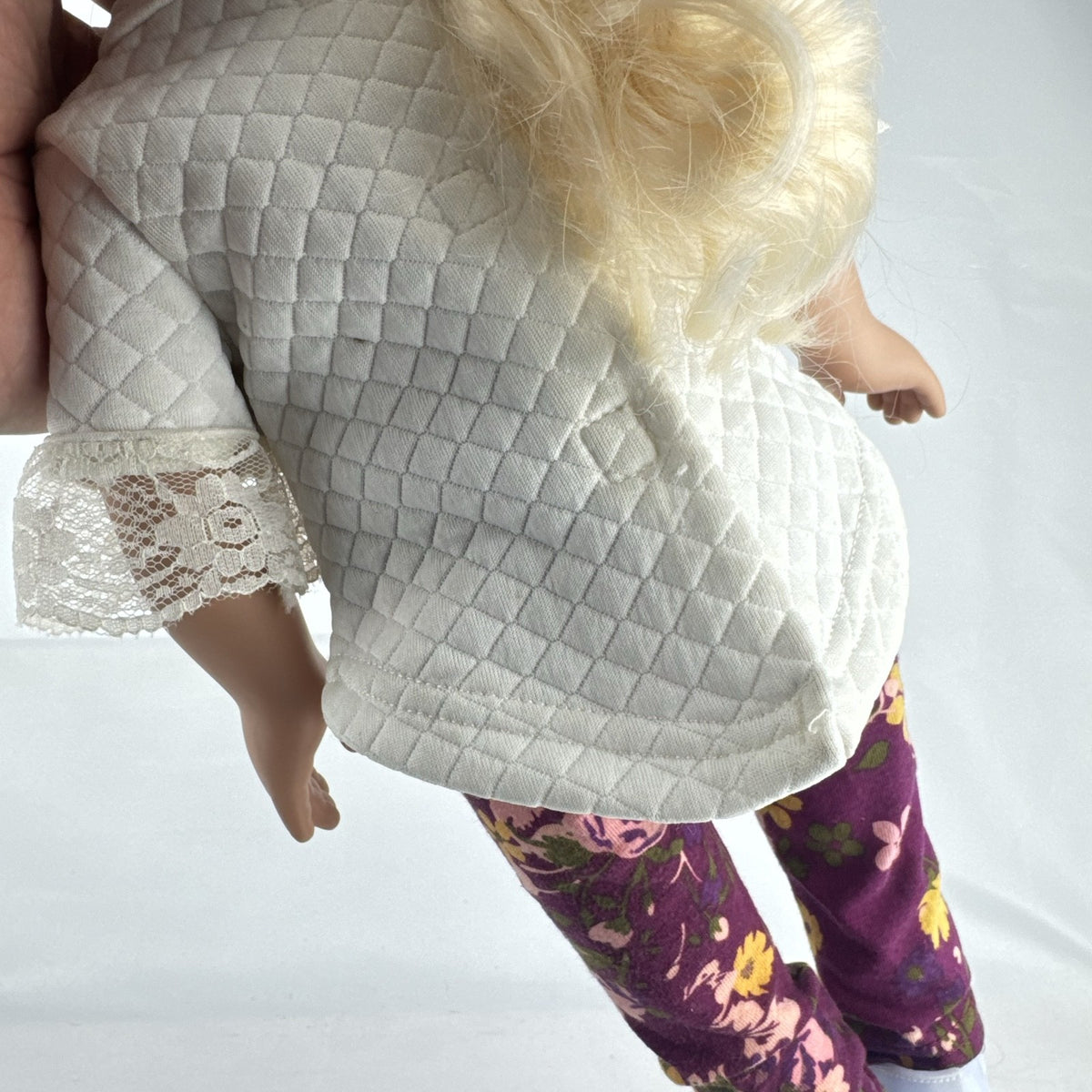 Cititoy 18-inch vinyl girl doll with curly blonde hair, blue highlights, green eyes, and floral outfit