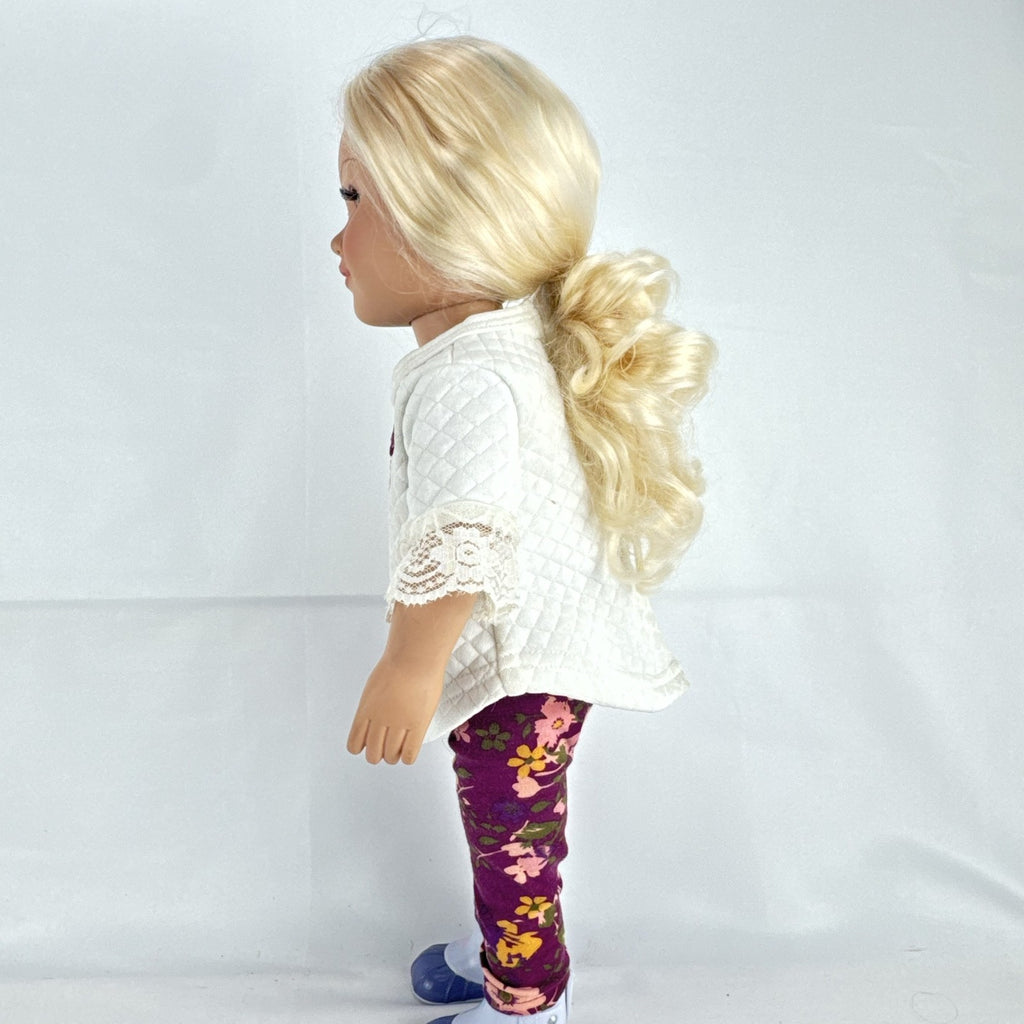 Cititoy 18-inch vinyl girl doll with curly blonde hair, blue highlights, green eyes, and floral outfit