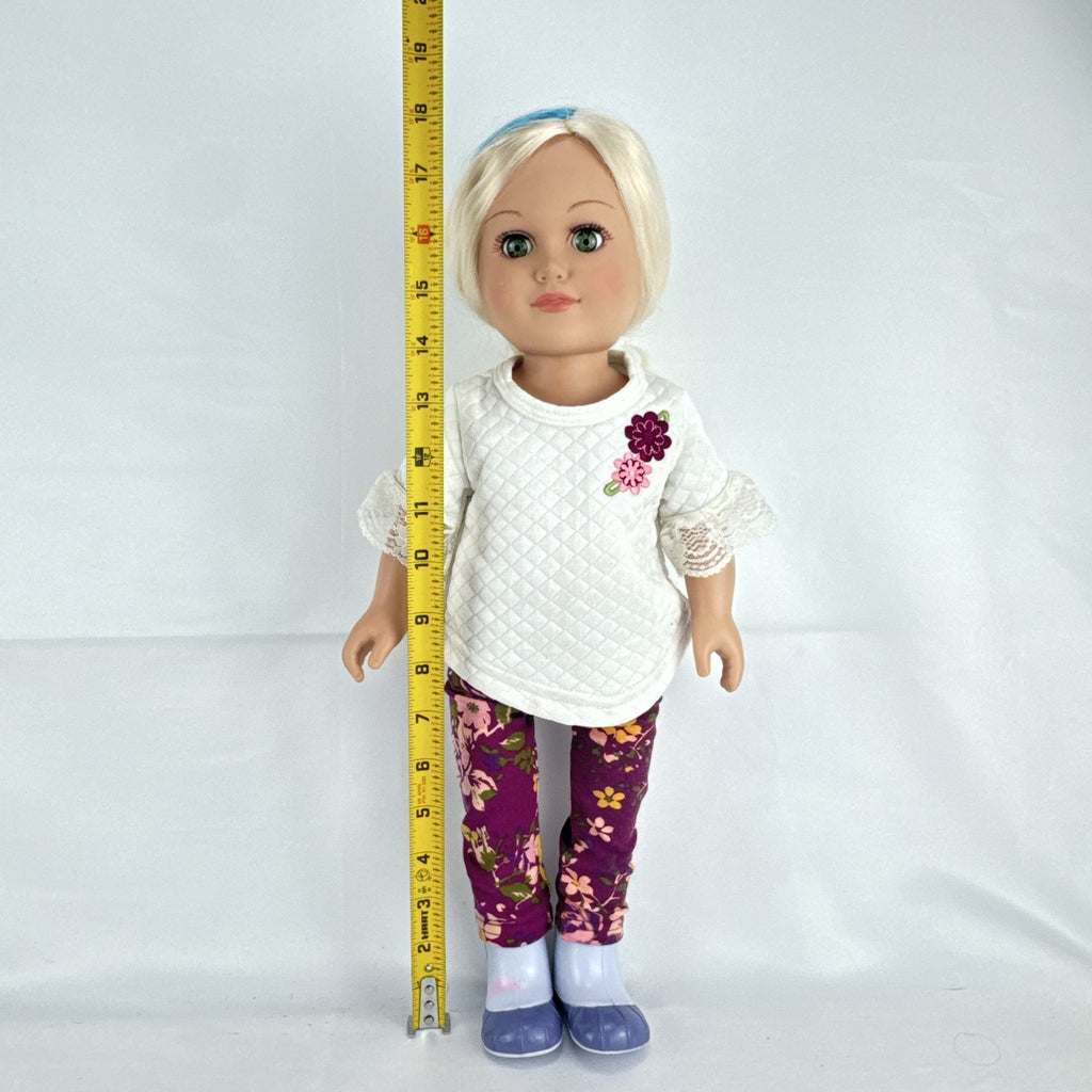 Cititoy 18-inch vinyl girl doll with curly blonde hair, blue highlights, green eyes, and floral outfit