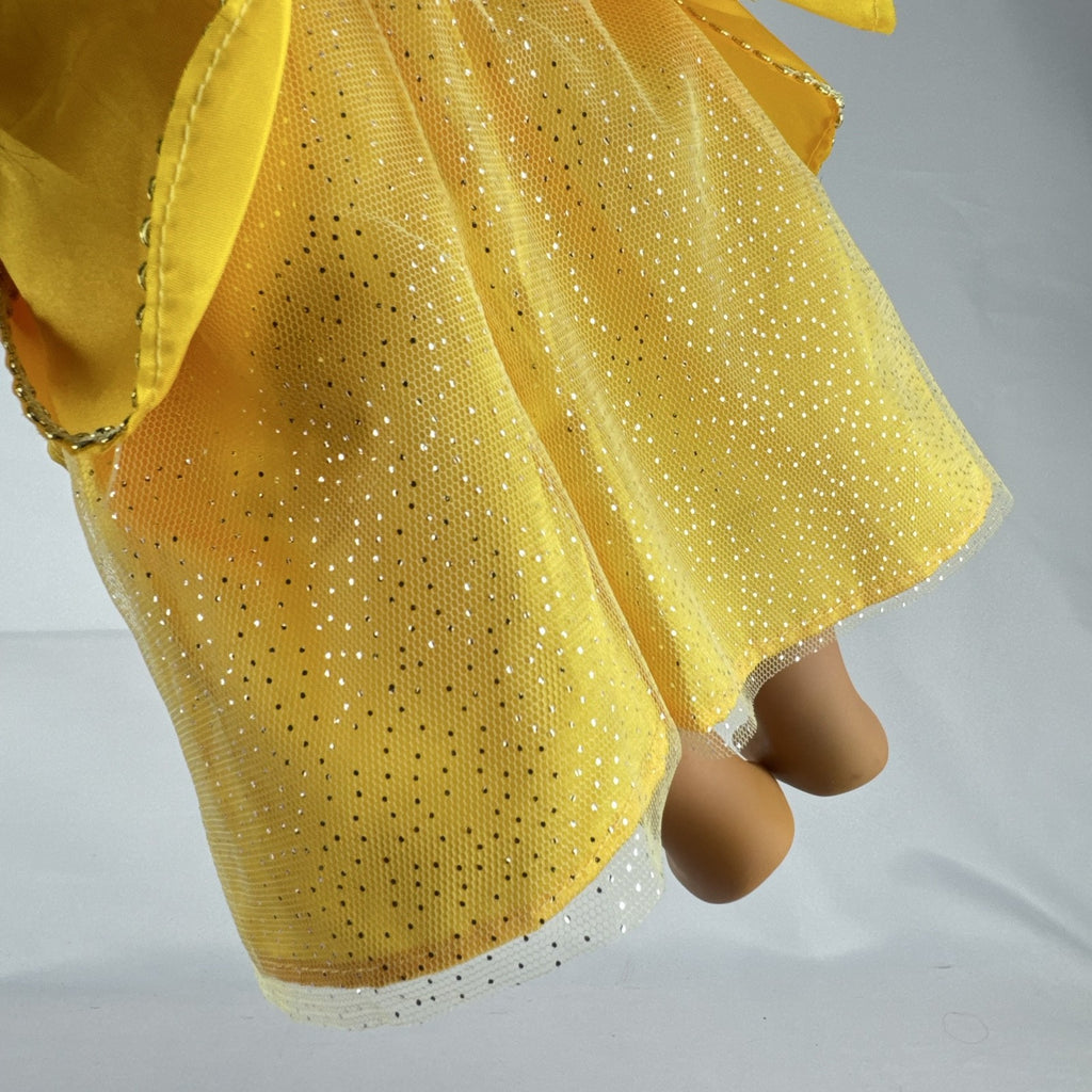 Battat Our Generation 18-inch doll with brown hair and eyes wearing a yellow princess gown