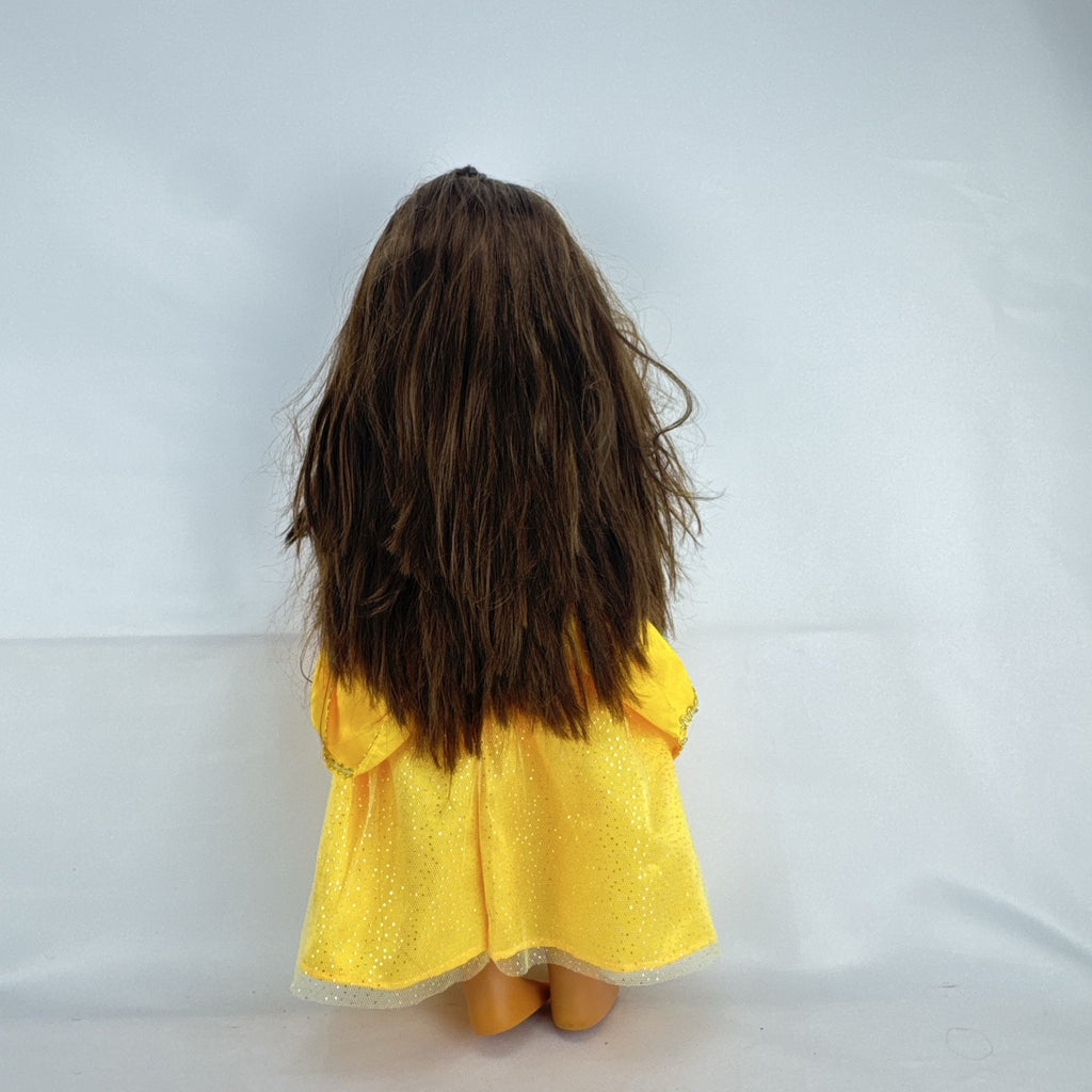 Battat Our Generation 18-inch doll with brown hair and eyes wearing a yellow princess gown