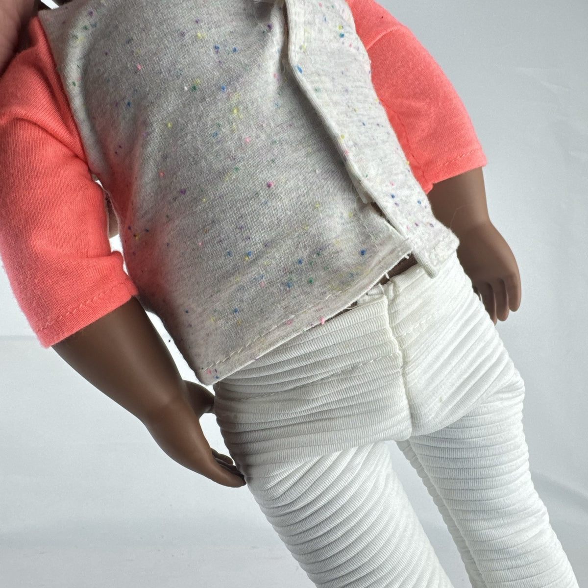 Battat Our Generation 18-inch African American doll with curly dark brown hair wearing a star shirt and white pants