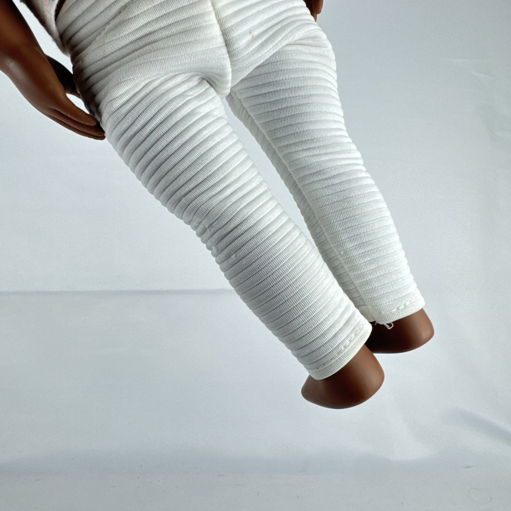 Battat Our Generation 18-inch African American doll with curly dark brown hair wearing a star shirt and white pants