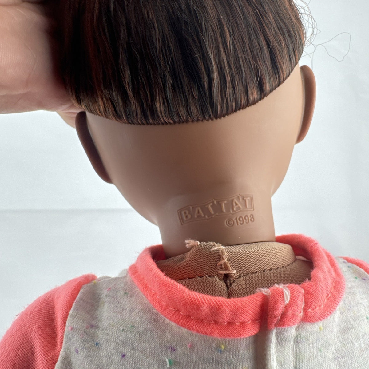 Battat Our Generation 18-inch African American doll with curly dark brown hair wearing a star shirt and white pants