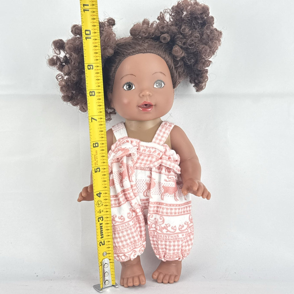 Smart Zone 10-inch African American vinyl baby doll with dark brown curly afro puff pigtails in a pink reindeer romper