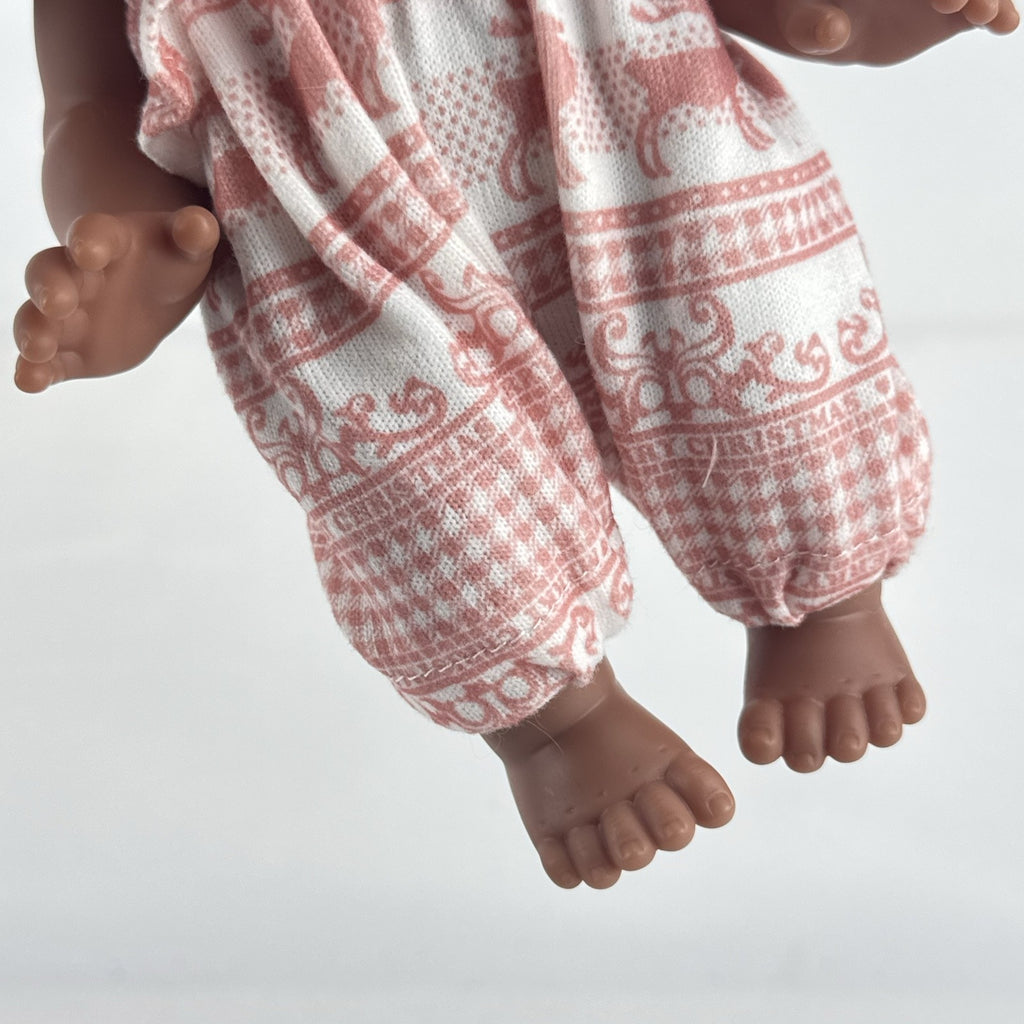 Smart Zone 10-inch African American vinyl baby doll with dark brown curly afro puff pigtails in a pink reindeer romper