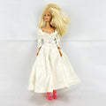 1998 Mattel Barbie doll in white satin and lace bridal wedding gown with blonde hair