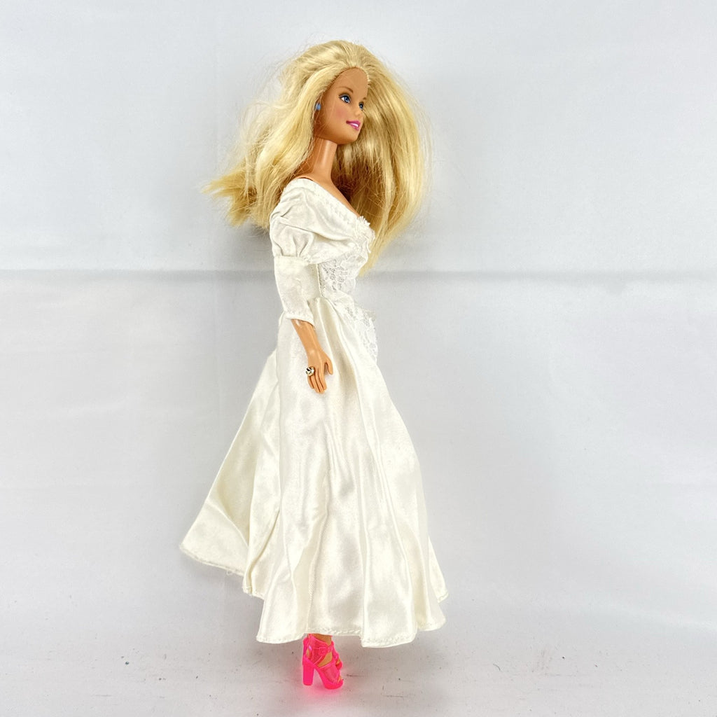 1998 Mattel Barbie doll in white satin and lace bridal wedding gown with blonde hair
