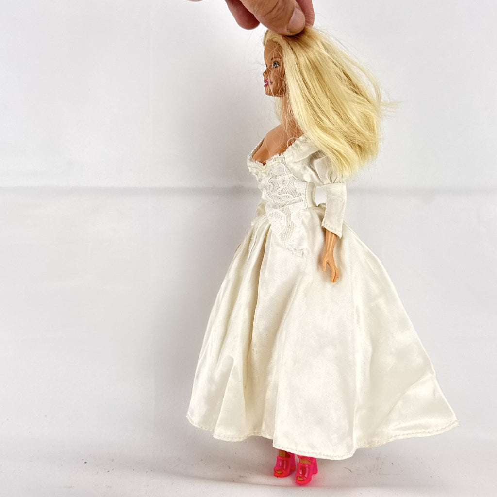 1998 Mattel Barbie doll in white satin and lace bridal wedding gown with blonde hair