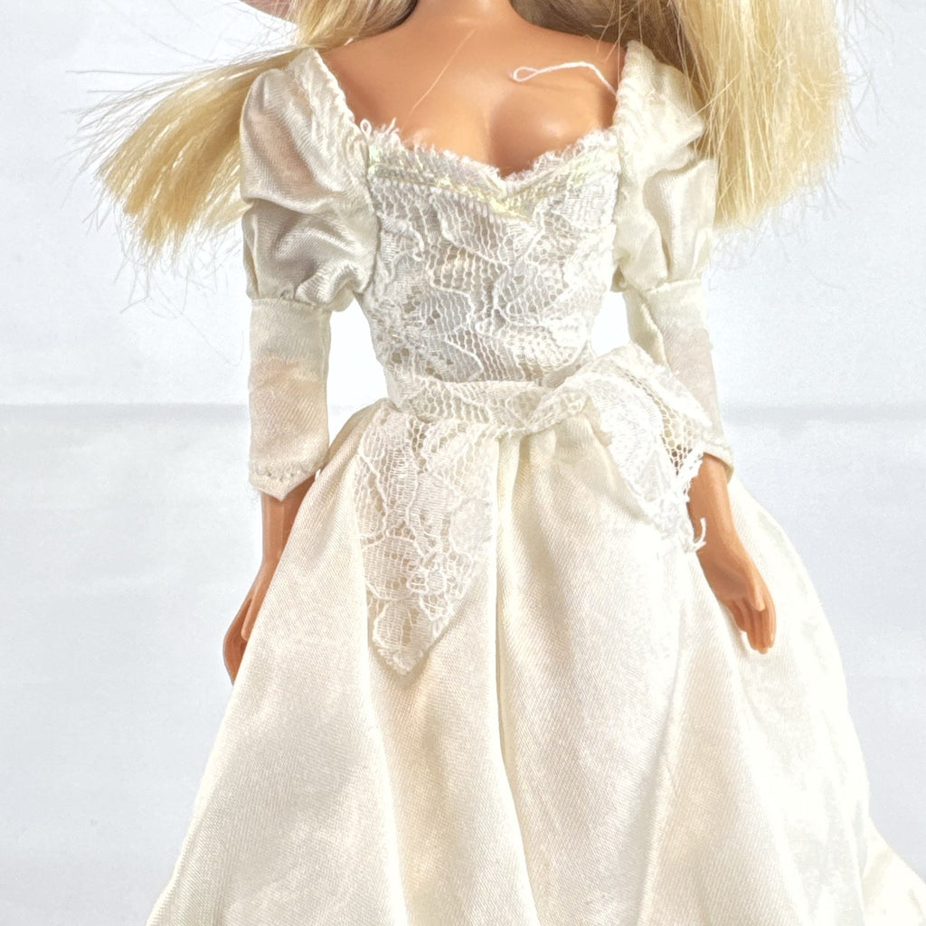 1998 Mattel Barbie doll in white satin and lace bridal wedding gown with blonde hair