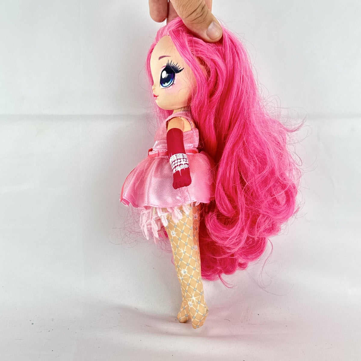 MGA Na! Na! Na! Surprise Teens 11-inch soft plush doll with long pink hair and ruffled dress