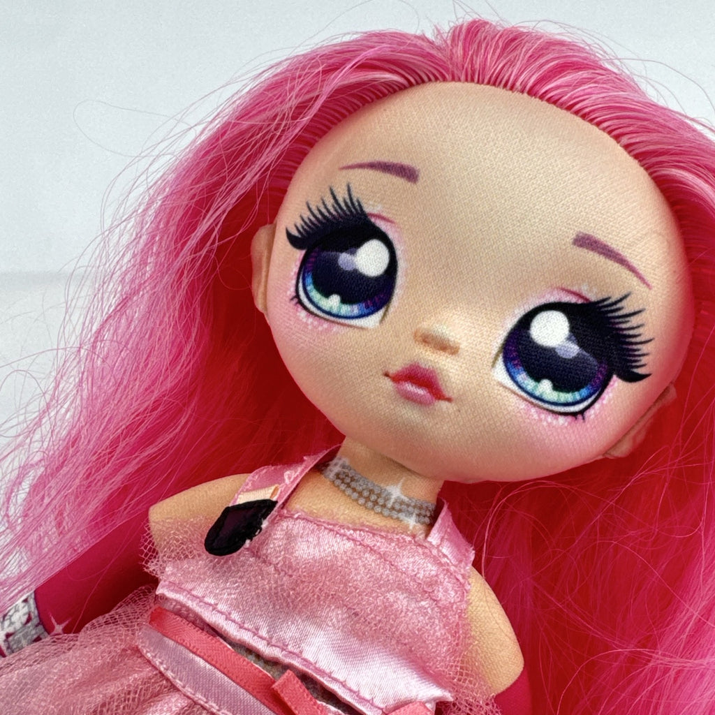 MGA Na! Na! Na! Surprise Teens 11-inch soft plush doll with long pink hair and ruffled dress