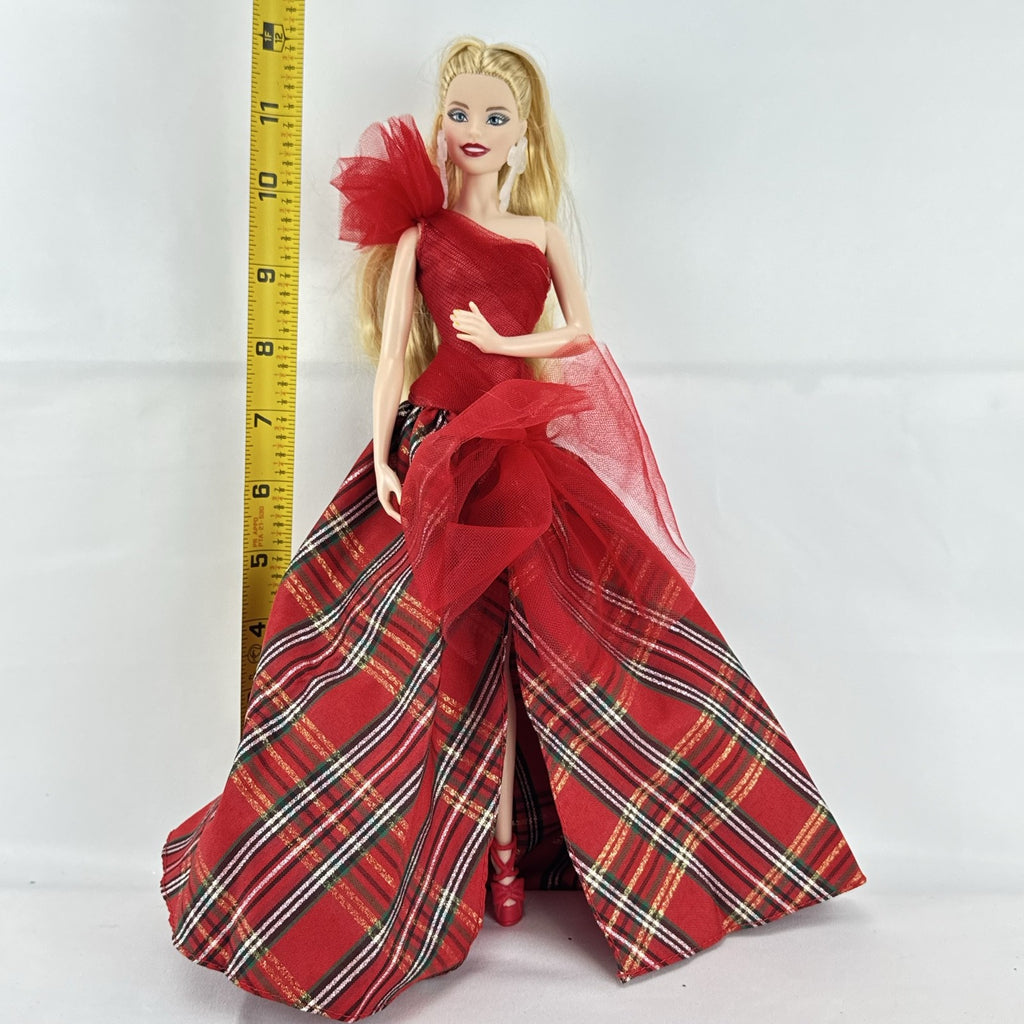 Mattel 2023 Holiday Barbie doll with blonde hair wearing a one-shoulder red plaid and tulle ballgown