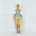 Mattel 2016 Ken doll with molded blonde hair in striped t-shirt and yellow shorts