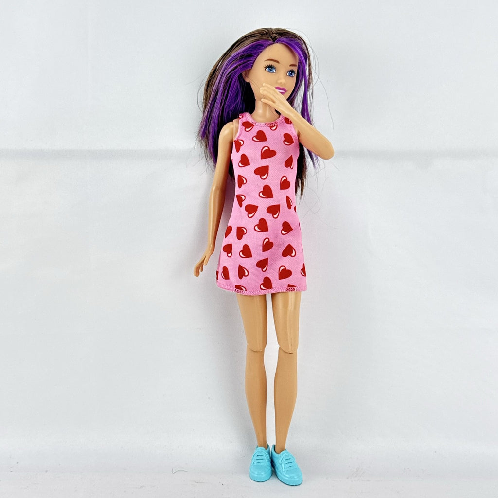 Mattel Barbie Skipper Babysitters Inc. doll with purple hair streaks in pink heart dress