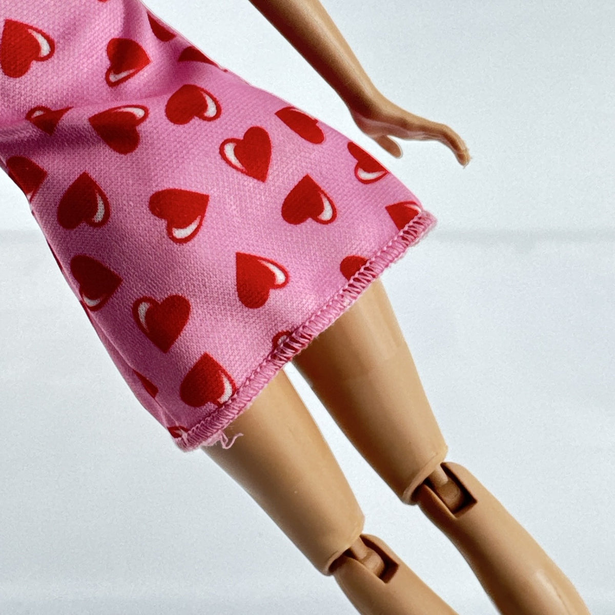 Mattel Barbie Skipper Babysitters Inc. doll with purple hair streaks in pink heart dress