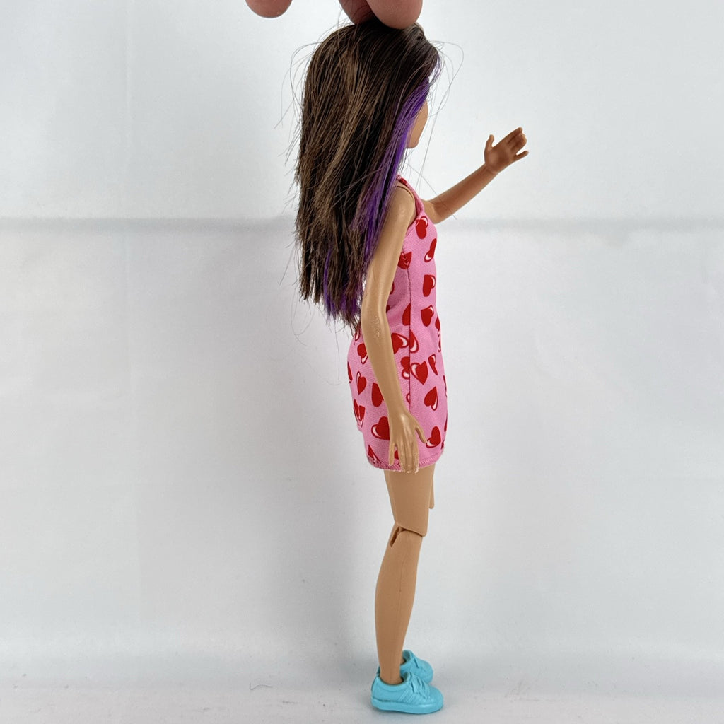 Mattel Barbie Skipper Babysitters Inc. doll with purple hair streaks in pink heart dress