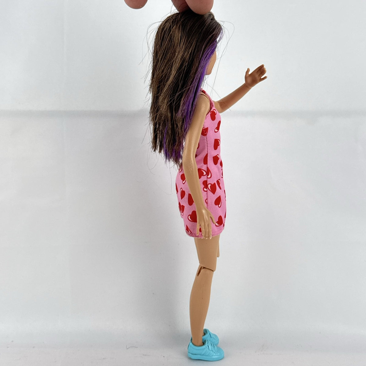Mattel Barbie Skipper Babysitters Inc. doll with purple hair streaks in pink heart dress
