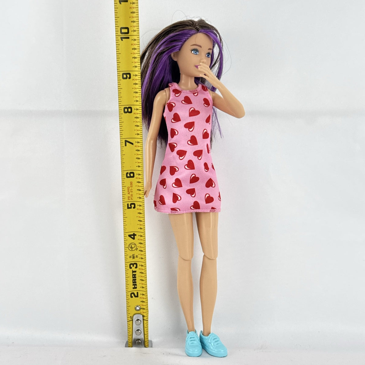 Mattel Barbie Skipper Babysitters Inc. doll with purple hair streaks in pink heart dress