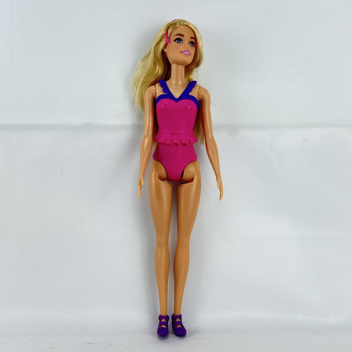 Mattel Barbie Dreamtopia ballerina doll with blonde hair, pink molded leotard, and tiara