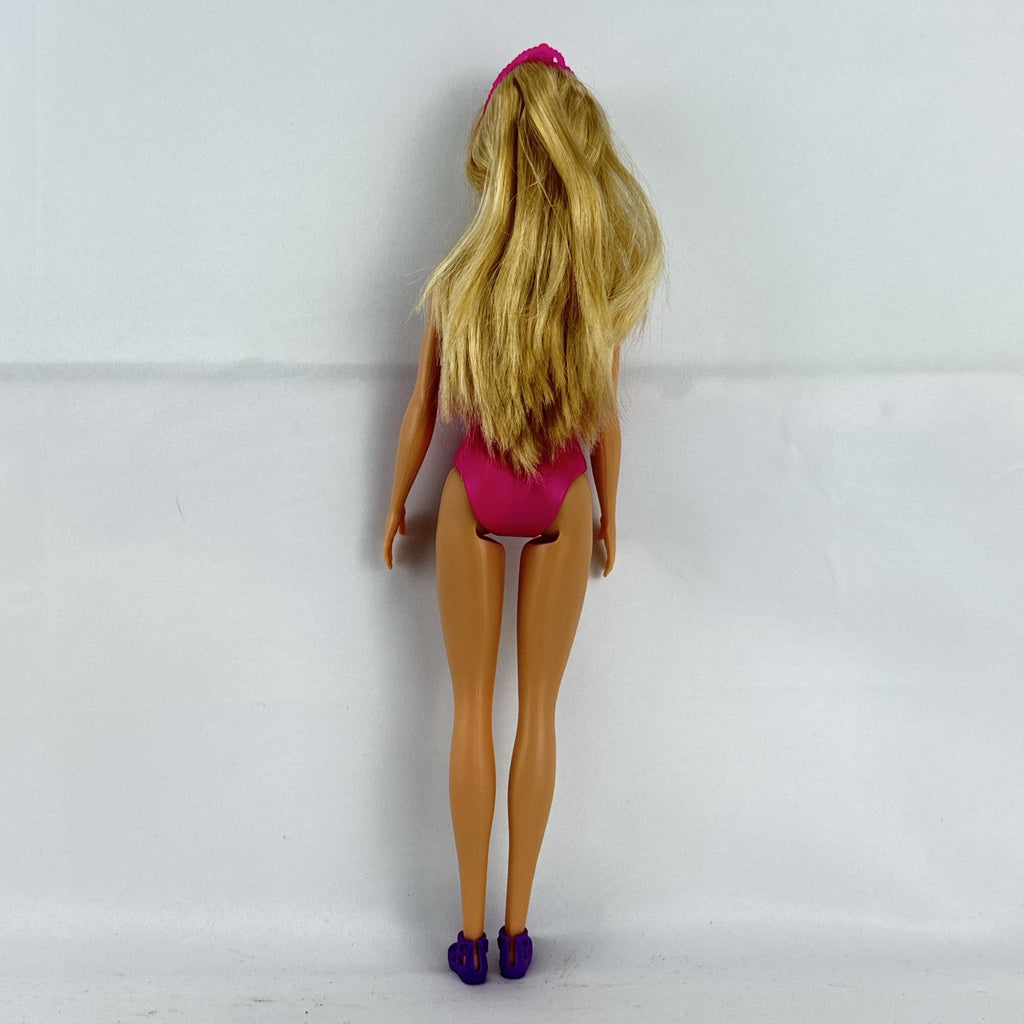 Mattel Barbie Dreamtopia ballerina doll with blonde hair, pink molded leotard, and tiara