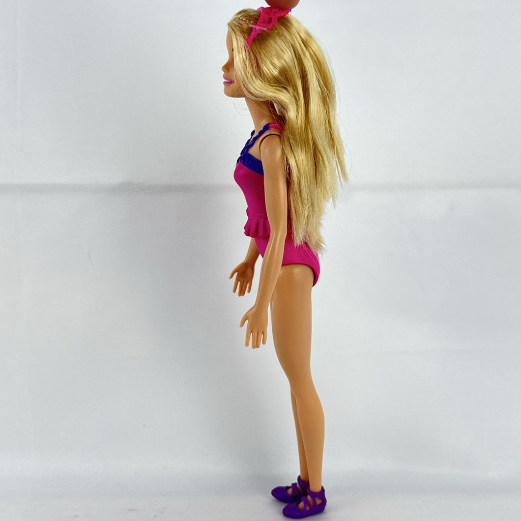 Mattel Barbie Dreamtopia ballerina doll with blonde hair, pink molded leotard, and tiara