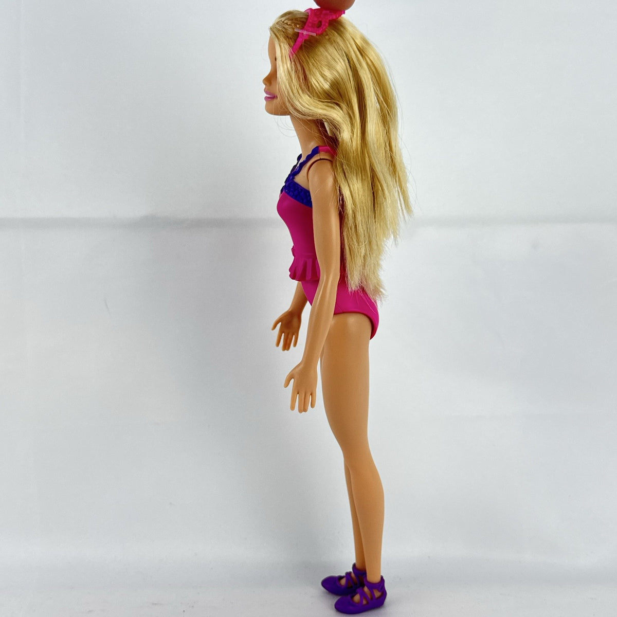Mattel Barbie Dreamtopia ballerina doll with blonde hair, pink molded leotard, and tiara