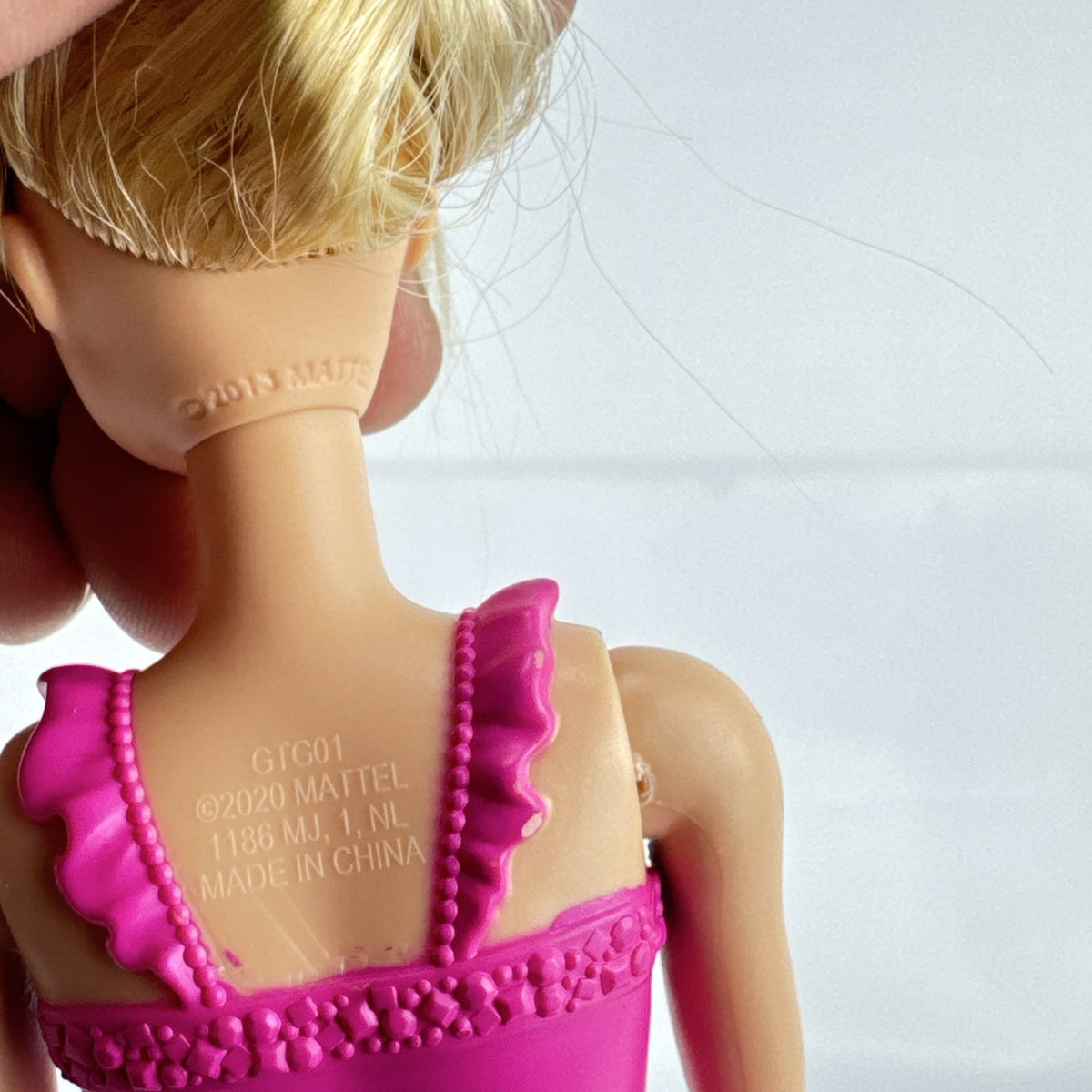 Mattel Barbie Dreamtopia ballerina doll with blonde hair, pink molded leotard, and tiara