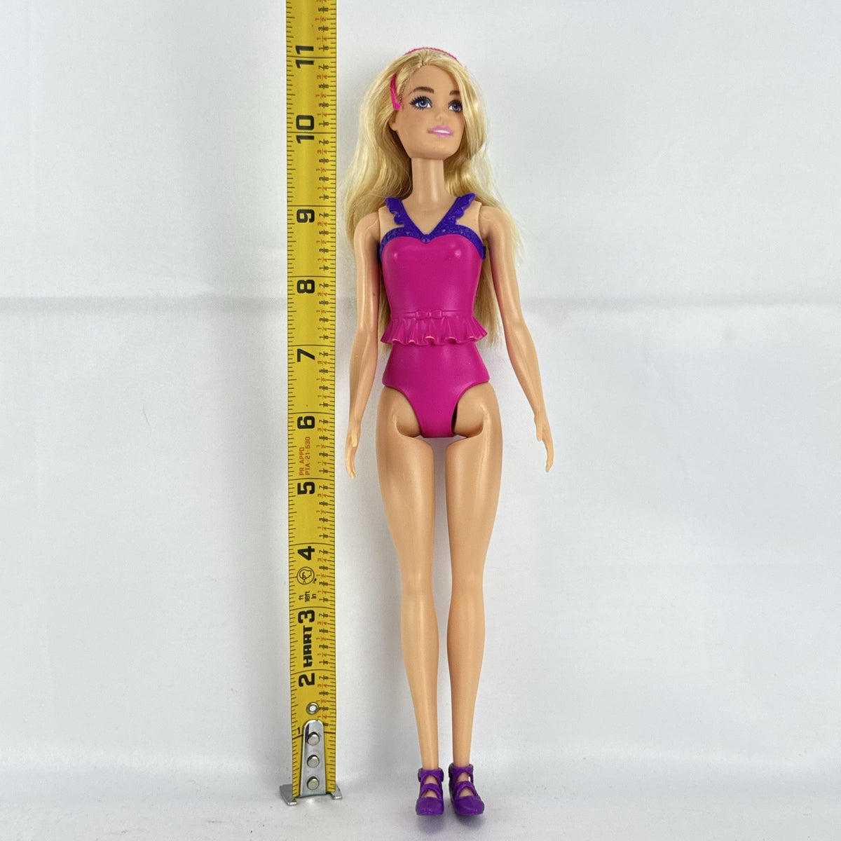 Mattel Barbie Dreamtopia ballerina doll with blonde hair, pink molded leotard, and tiara