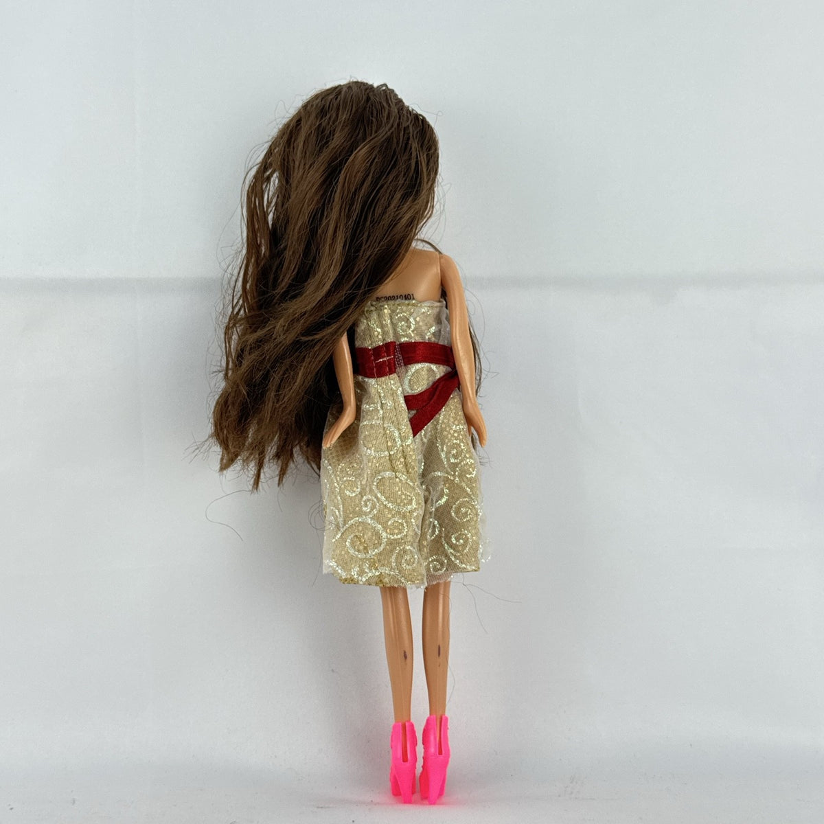 ZURU Sparkle Girlz 10-inch fashion doll with brown hair, cream and gold dress, and bright pink boots