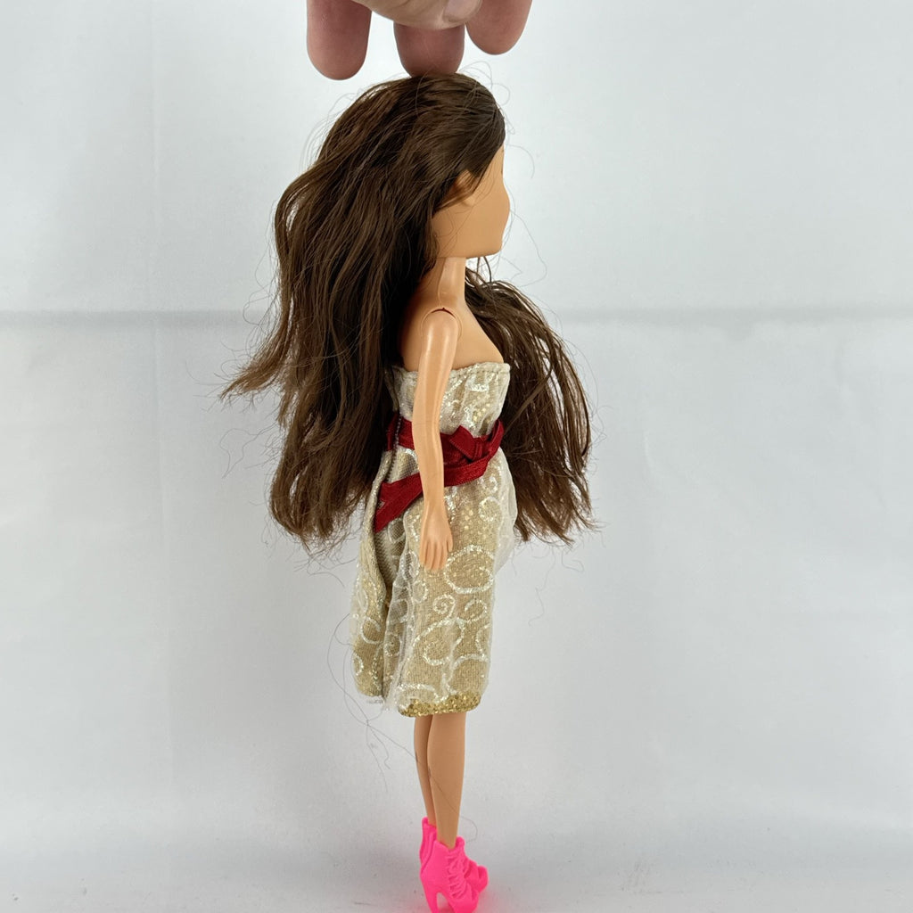 ZURU Sparkle Girlz 10-inch fashion doll with brown hair, cream and gold dress, and bright pink boots