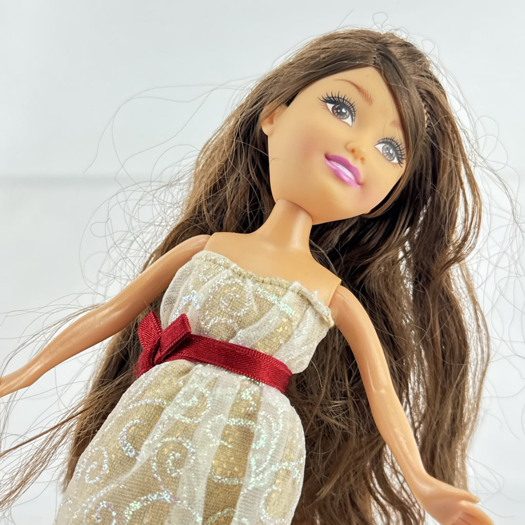 ZURU Sparkle Girlz 10-inch fashion doll with brown hair, cream and gold dress, and bright pink boots
