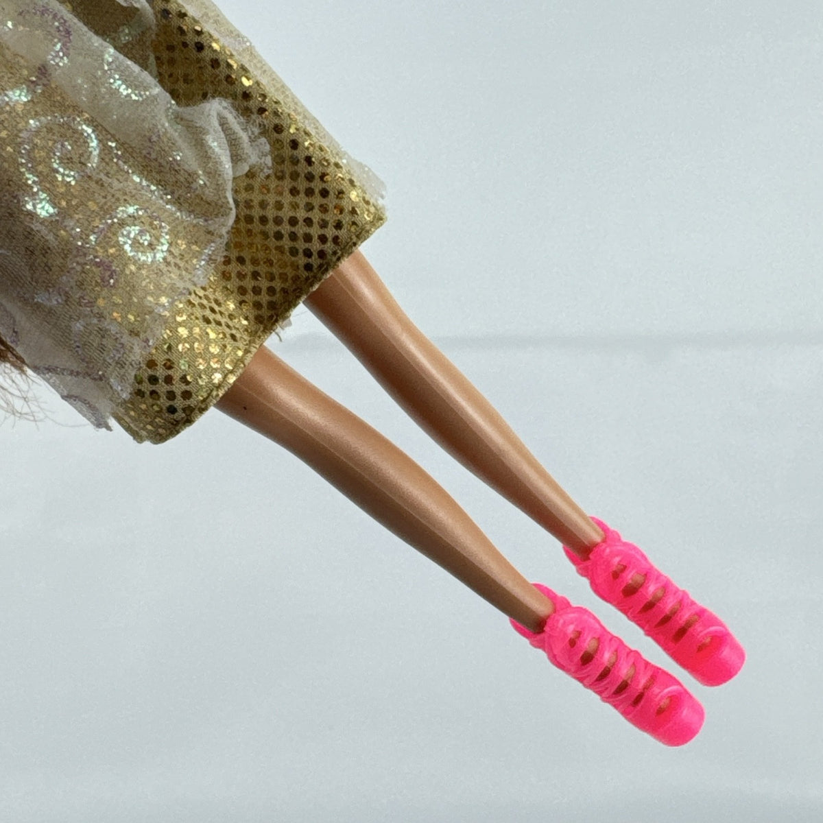 ZURU Sparkle Girlz 10-inch fashion doll with brown hair, cream and gold dress, and bright pink boots