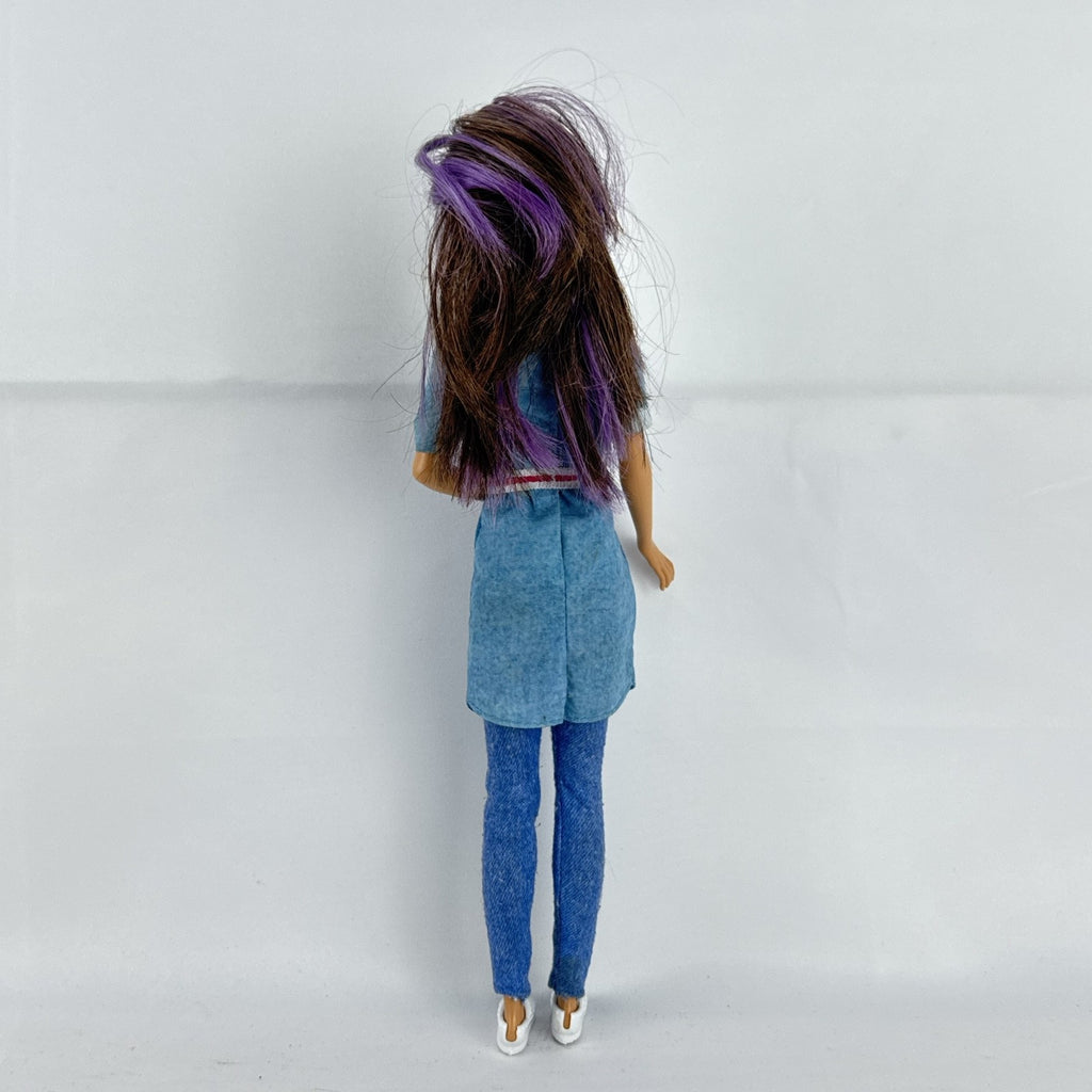 Mattel Barbie Dreamhouse Adventures Skipper doll with purple hair in denim tunic and white shoes