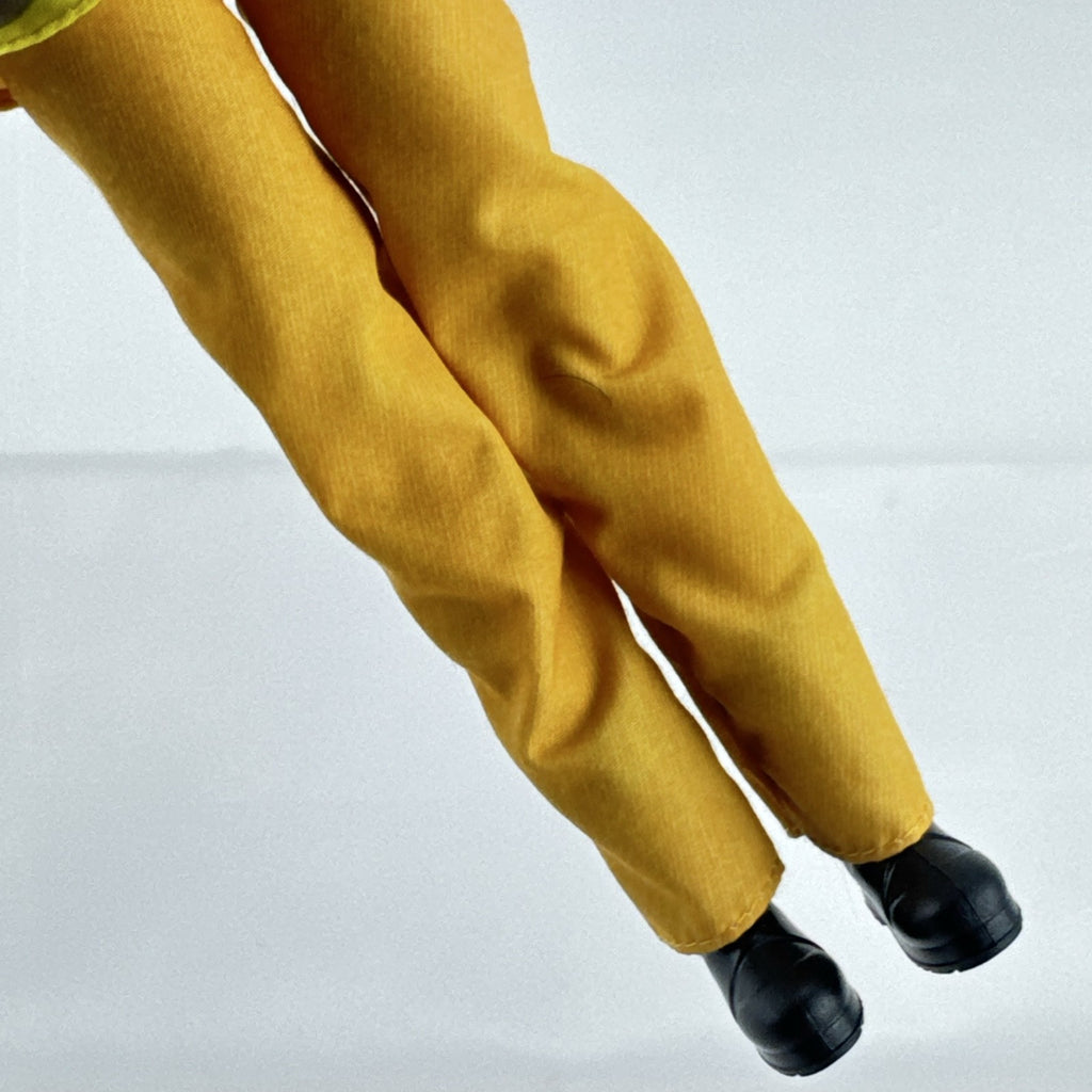 Mattel Barbie Careers blonde firefighter doll wearing yellow rescue suit and black boots